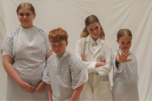Boys & girls in hospital gowns